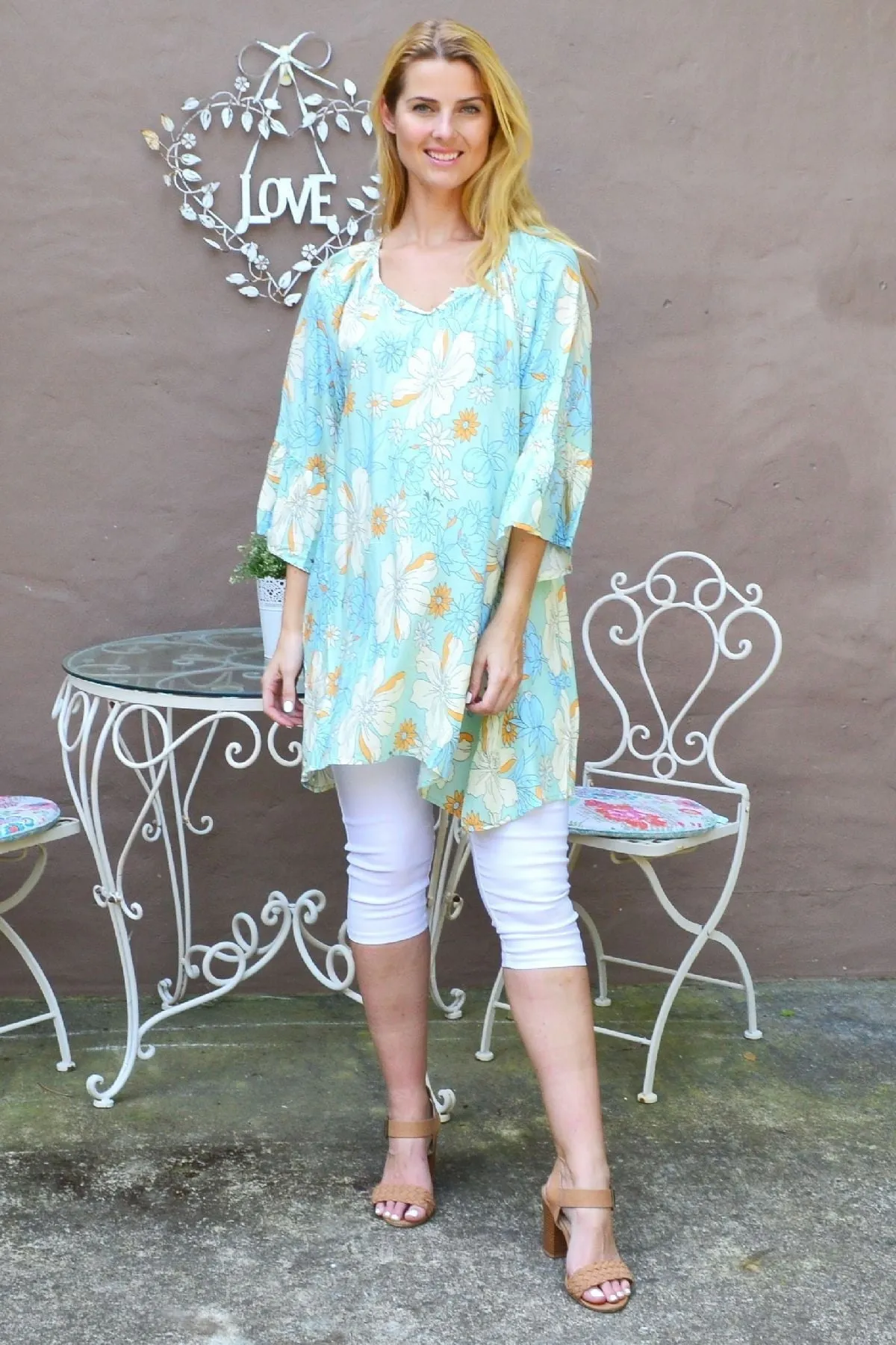 Bold Yellow Flower Pearl Button Tunic Top