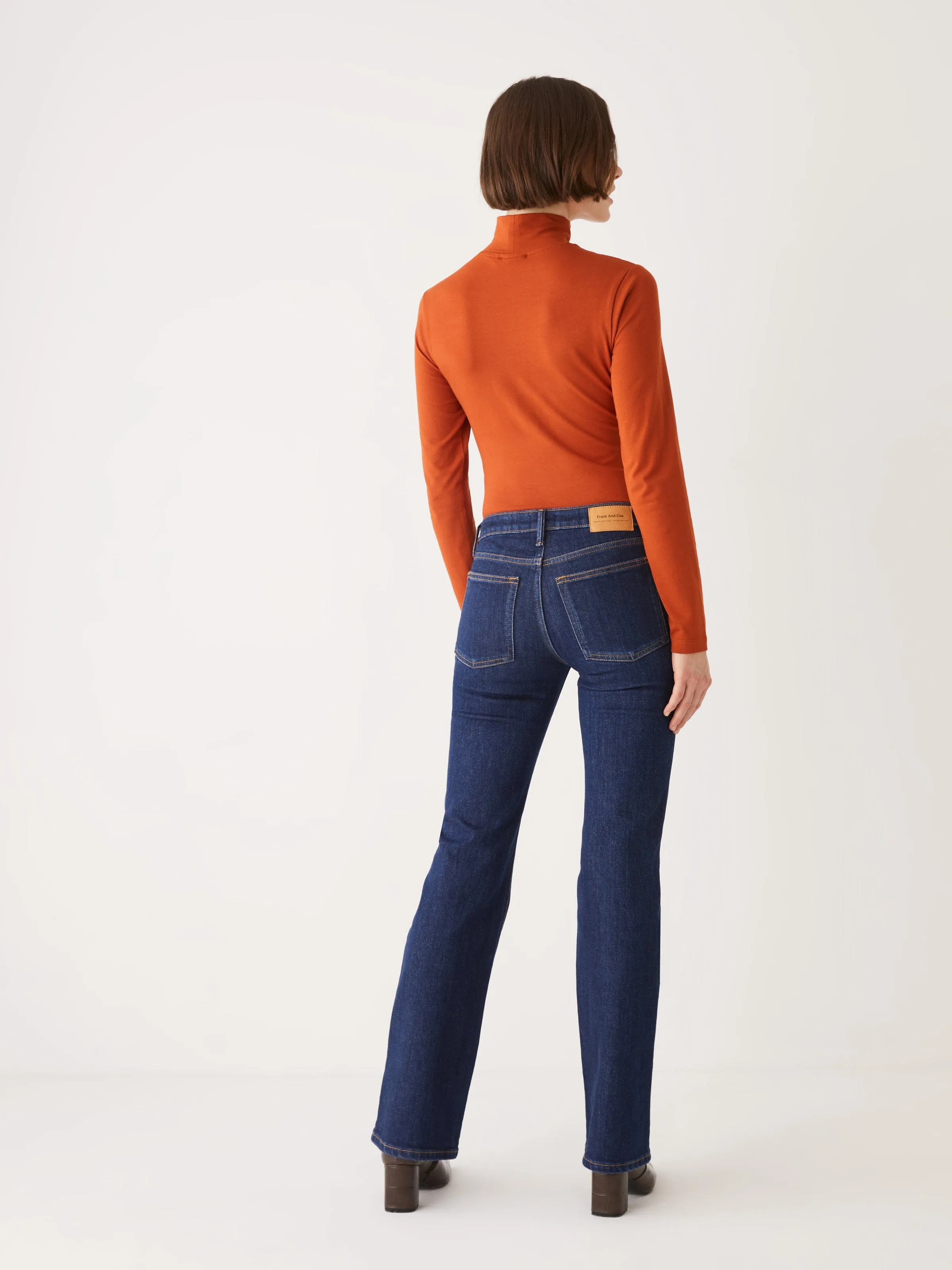 The Joan Mid Rise Bootcut Fit Jean in Dark Indigo